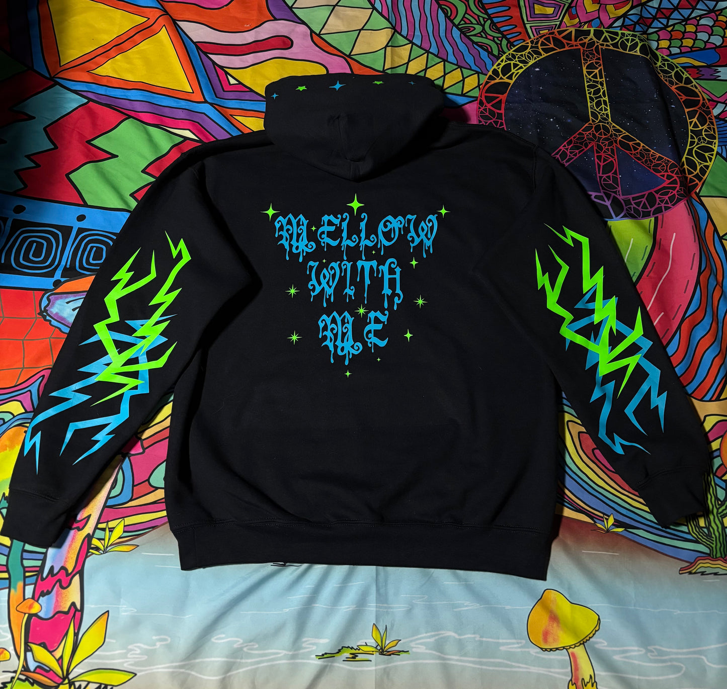 A “Astral Mellow” Glow in the Dark Hoodie